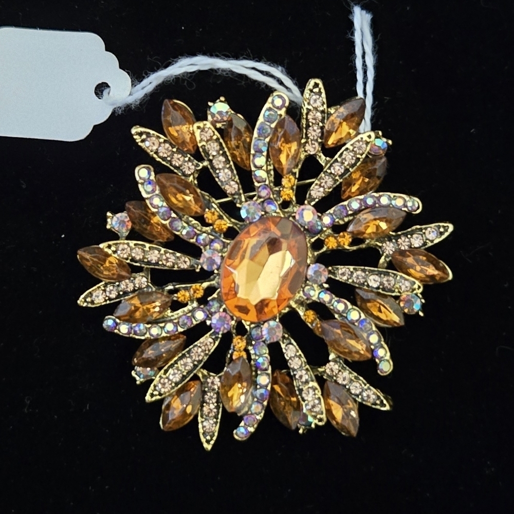 Elegant Gold and Orange Brooch